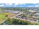 An aerial view showing the neighborhood and local baseball fields and stadium at 2705 N Martha Ave, Lakeland, FL 33805