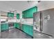 Green kitchen featuring stainless steel appliances, and marble countertops at 2705 N Martha Ave, Lakeland, FL 33805