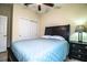 Bedroom featuring a ceiling fan and a sliding-door closet at 297 Spirit Landings Cir, Winter Haven, FL 33880