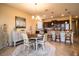 Cozy dining area adjacent to the kitchen with stylish furnishings and decor at 297 Spirit Landings Cir, Winter Haven, FL 33880
