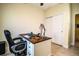 Office space with a large desk, tile floor and storage space at 297 Spirit Landings Cir, Winter Haven, FL 33880