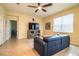 Spacious living room with a large television, comfortable seating, and a seamless open layout at 297 Spirit Landings Cir, Winter Haven, FL 33880