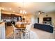 Spacious layout with the dining area, kitchen, and living room with seamless flow at 297 Spirit Landings Cir, Winter Haven, FL 33880