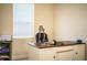 Office showcasing natural light, a desk, and an office chair at 297 Spirit Landings Cir, Winter Haven, FL 33880