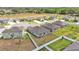 Overhead shot of homes in a residential area showcasing spacious yards and community design at 2991 Flying Blackbird Rd, Bartow, FL 33830