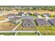 Aerial view of a suburban neighborhood highlighting the layout and surrounding landscape at 2991 Flying Blackbird Rd, Bartow, FL 33830