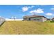 Spacious backyard with privacy fence and expansive lawn at 2991 Flying Blackbird Rd, Bartow, FL 33830