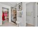 Bathroom featuring a glass shower, closet access, tiled floor, and modern fixtures at 2991 Flying Blackbird Rd, Bartow, FL 33830