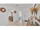 Bright entryway showcases tile flooring and views of the adjacent rooms, creating a welcoming first impression at 2991 Flying Blackbird Rd, Bartow, FL 33830