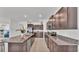 Spacious kitchen with granite countertops, stainless steel appliances, and ample cabinet space at 2991 Flying Blackbird Rd, Bartow, FL 33830
