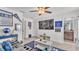 Relaxing living room with recliner, fan, and posters at 2991 Flying Blackbird Rd, Bartow, FL 33830