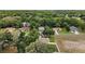 A home nestled in a lush neighborhood, offering a serene and private setting at 305 Woods Landing Dr, Lady Lake, FL 32159