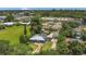 House with solar panels, a well-maintained lawn, and close proximity to commercial areas at 317 S 8Th St, Haines City, FL 33844