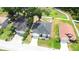 Aerial view of the home, surrounded by landscaped lawns at 3281 Enclave Blvd, Mulberry, FL 33860