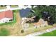 Aerial view of a fenced backyard with a fire pit and seating at 3281 Enclave Blvd, Mulberry, FL 33860