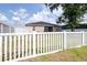 Fenced-in backyard featuring a fire pit with seating at 3281 Enclave Blvd, Mulberry, FL 33860