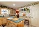 Functional kitchen with island, ample cabinet space, and decorative accents at 330 W Palmetto St, Lakeland, FL 33815