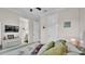 Cozy bedroom with neutral walls, soft bedding, and ample natural light at 3926 Aquilla Dr, Lakeland, FL 33810
