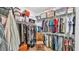 Walk in closet with built in shelving, hanging racks, and an abundance of space for storing personal items at 3926 Aquilla Dr, Lakeland, FL 33810