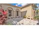 Charming courtyard featuring stone benches, decorative shutters, and lush landscaping with a paver-style ground at 3926 Aquilla Dr, Lakeland, FL 33810
