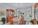 Elegant dining room with ample natural light, classic decor, and seating for six at 3926 Aquilla Dr, Lakeland, FL 33810