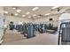 Well-equipped gym featuring modern exercise machines, ceiling fans, and ample natural light from the surrounding windows at 3926 Aquilla Dr, Lakeland, FL 33810