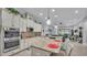 Spacious kitchen with granite countertops, stainless steel appliances and open access to the living area at 3926 Aquilla Dr, Lakeland, FL 33810
