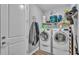 Well-equipped laundry room with modern washer and dryer units at 3926 Aquilla Dr, Lakeland, FL 33810