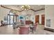 Welcoming lobby area featuring comfortable seating, tile floors, and elegant lighting fixtures, with a view to the outdoors at 3926 Aquilla Dr, Lakeland, FL 33810