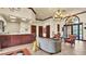 Inviting lobby area features a reception desk, comfortable seating, and elegant lighting, creating a welcoming atmosphere at 3926 Aquilla Dr, Lakeland, FL 33810