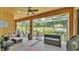 Screened in patio with outdoor furniture providing a comfortable space to relax and enjoy the outdoors at 3926 Aquilla Dr, Lakeland, FL 33810