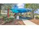 Well-maintained community playground with slides, climbing structures, and shade canopies for safe outdoor fun at 3926 Aquilla Dr, Lakeland, FL 33810