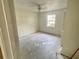 Bedroom with a ceiling fan and window for ample natural light at 4038 Lehman Ln, Lakeland, FL 33813