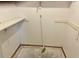 Walk-in closet with shelves and a broom on the floor at 4038 Lehman Ln, Lakeland, FL 33813