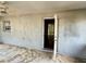 Covered patio with an open door leading to the interior at 4038 Lehman Ln, Lakeland, FL 33813