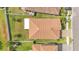 Bird's eye view of the home's roof, backyard and driveway in a well-kept neighborhood at 4088 Prima Lago Cir, Lakeland, FL 33810