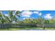 Fenced outdoor basketball court with hoops providing recreational opportunities within the community at 4088 Prima Lago Cir, Lakeland, FL 33810