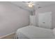 This is a cozy bedroom with a double door closet and fan at 4088 Prima Lago Cir, Lakeland, FL 33810