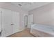 Bedroom with an extra-large closet and a fan at 4088 Prima Lago Cir, Lakeland, FL 33810
