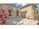 Charming courtyard with stone benches, decorative columns, and beautiful landscaping at 4088 Prima Lago Cir, Lakeland, FL 33810