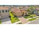 Beautiful single-Gathering home featuring a tile roof, manicured landscaping and a two-car garage at 4088 Prima Lago Cir, Lakeland, FL 33810