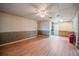Large living room with an open layout, showcasing the home's potential at 415 Manor Dr, Bartow, FL 33830