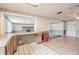 Open living space with a view to the kitchen area, perfect for entertaining at 415 Manor Dr, Bartow, FL 33830