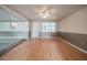 Bright living room with large windows, providing ample natural light at 415 Manor Dr, Bartow, FL 33830