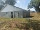 The backyard features a small patio area and wood fence at 420 S 9Th Ave, Bartow, FL 33830