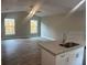Open-concept living area featuring sleek floors, recessed lighting, and natural light at 420 S 9Th Ave, Bartow, FL 33830