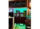 Stylish bar area features swinging saloon doors and a unique 'Cowboy Bob' sign, creating a fun and inviting atmosphere at 4404 Musket Dr, Lakeland, FL 33810