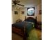 Spacious bedroom with ceiling fan and wood furnishings at 4404 Musket Dr, Lakeland, FL 33810