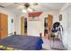 Bedroom featuring carpet, bed and closets at 4404 Musket Dr, Lakeland, FL 33810