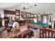 Recreation room with pool table, fireplace, wet bar, and cozy seating for relaxation and entertainment at 4404 Musket Dr, Lakeland, FL 33810